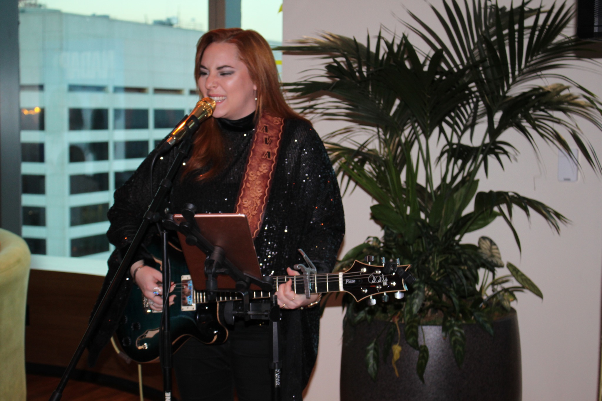 Guitarist singing NADAP Anniversary Reception, 2023