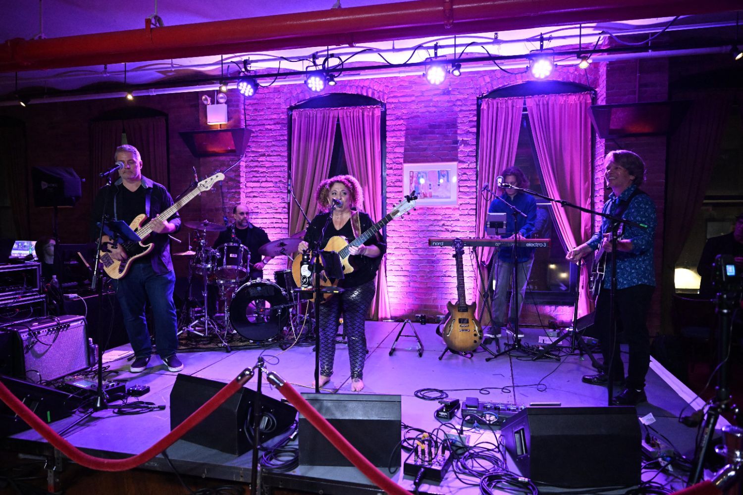 Band performing on stage A Night to Remember, 2023
