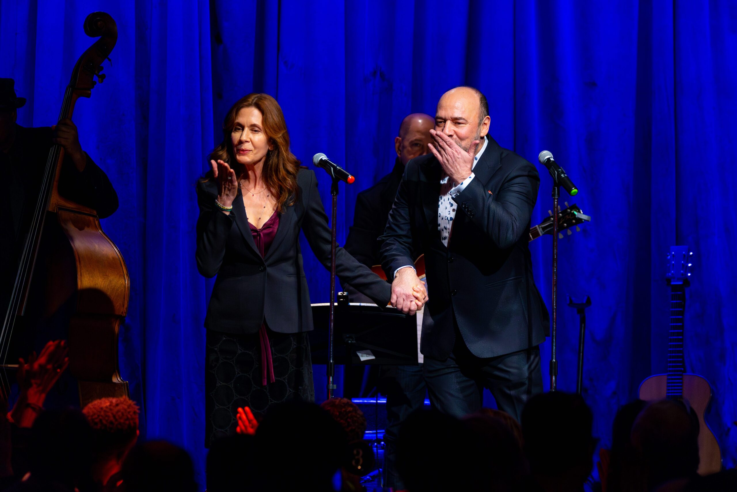 Man and woman on stage blowing kisses to audience Embrace the Season, A Drama League Gala Celebration, 2023